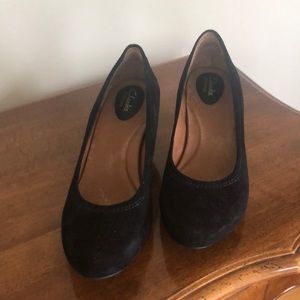 Black suede pump.